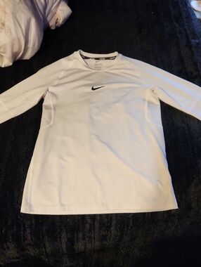 Nike White Long Sleeve Athletic Top with Black Swoosh